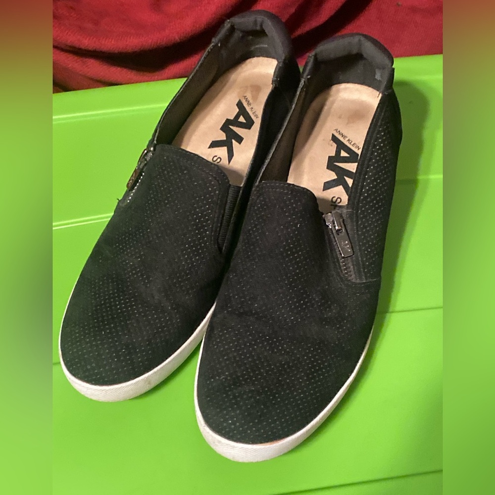 Anne Klein Black Perforated Slip-On Sneakers with White Sole